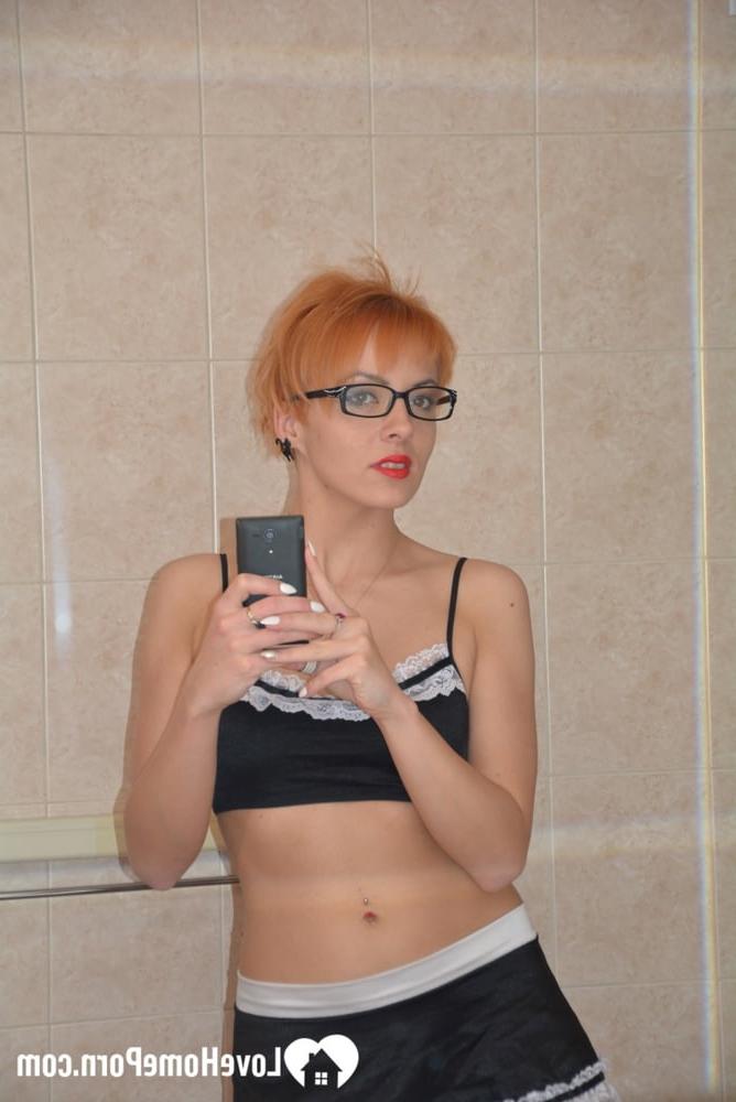 16P Redheaded MILF strips her maid uniform and poses naked in the bathtub