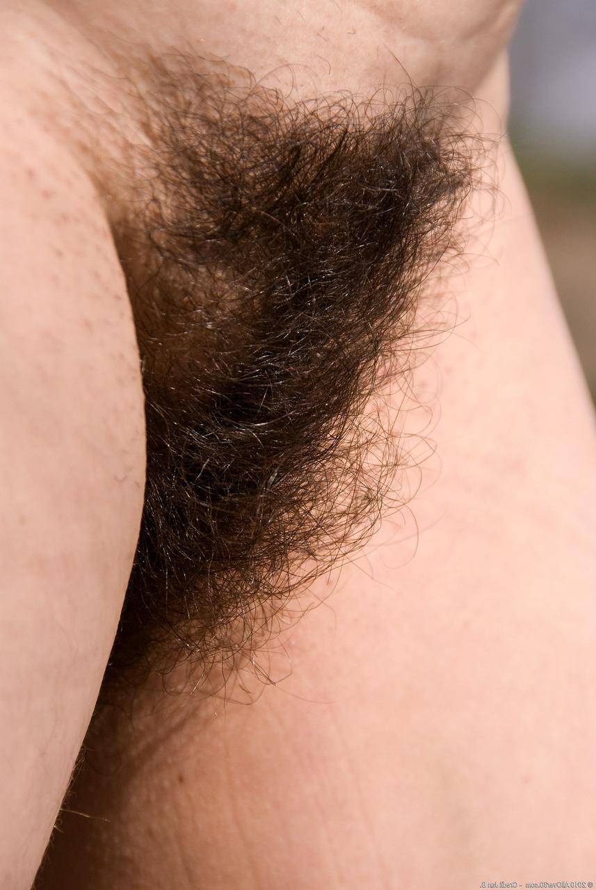 20P Naughty MILF Sandra K strips fully naked & shows off her hairy pussy outdoors