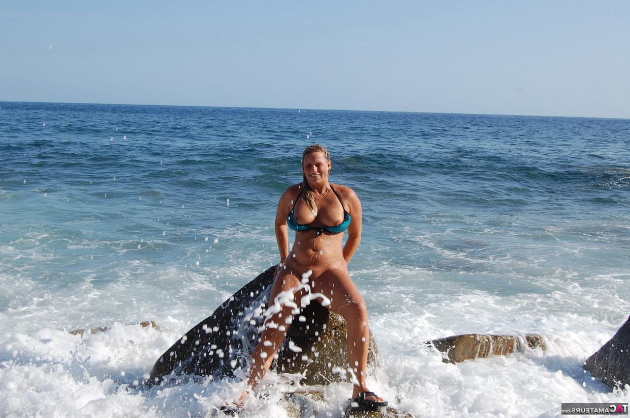 16P Blonde MILF Sweet Susi gets soaking wet in the ocean with no bikini bottoms on