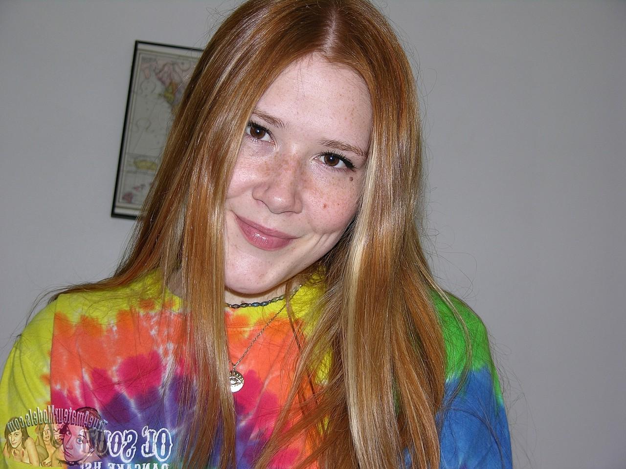 16P Natural redhead Harper R Model tugs on a cock during her first nude show