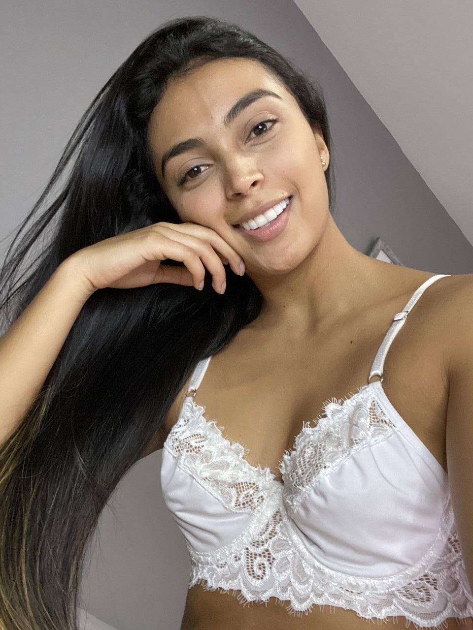 14P Beautiful Latina babe Daniela Alonso teases with her firm ass in sexy undies