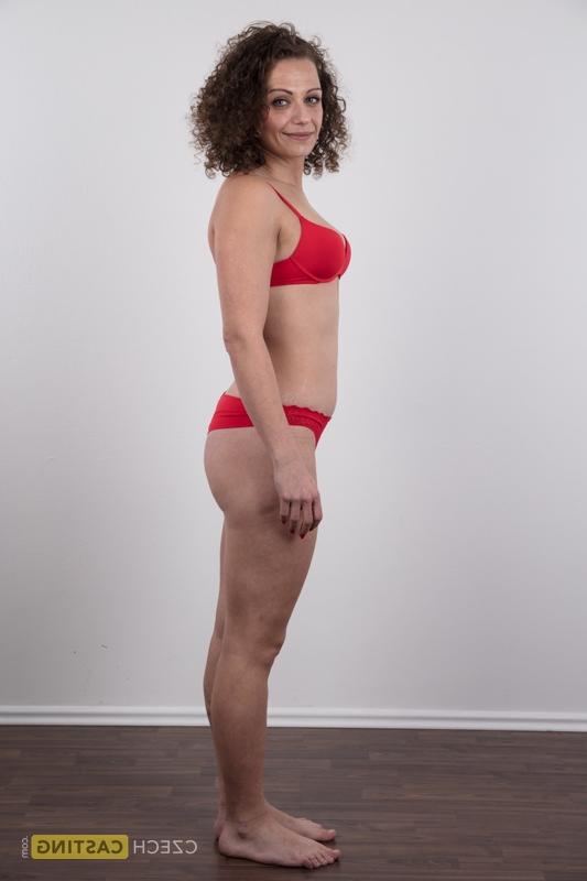 20P First timer with curly hair gets naked before a close-up of her bald pussy