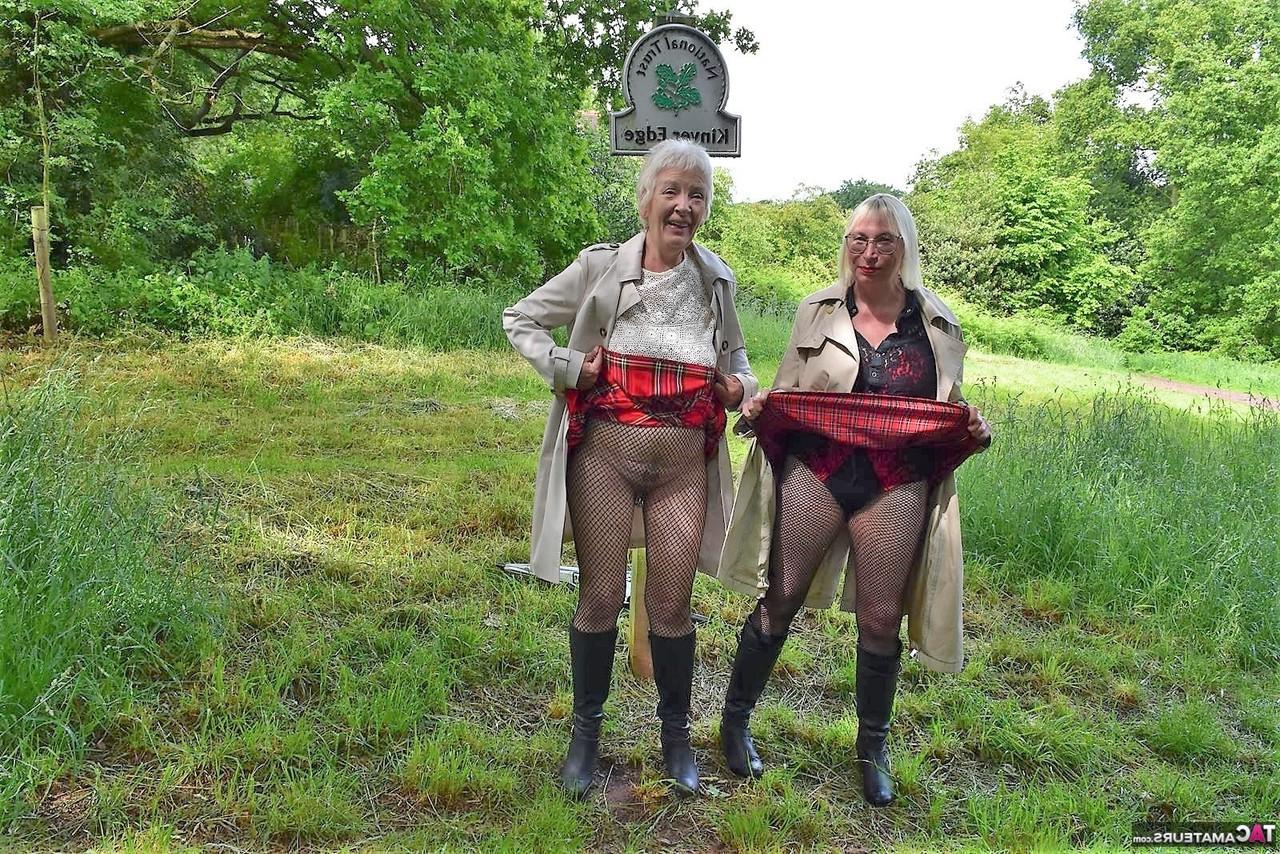 16P Barby Slut and a girlfriend flashe in a public park while wearing black boots