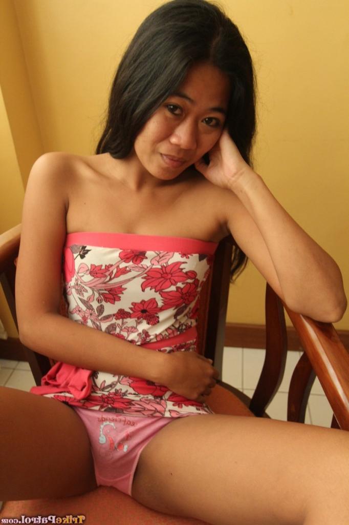 18P Petite spinner Trixie in sundress flashes hairy muff before stripping naked