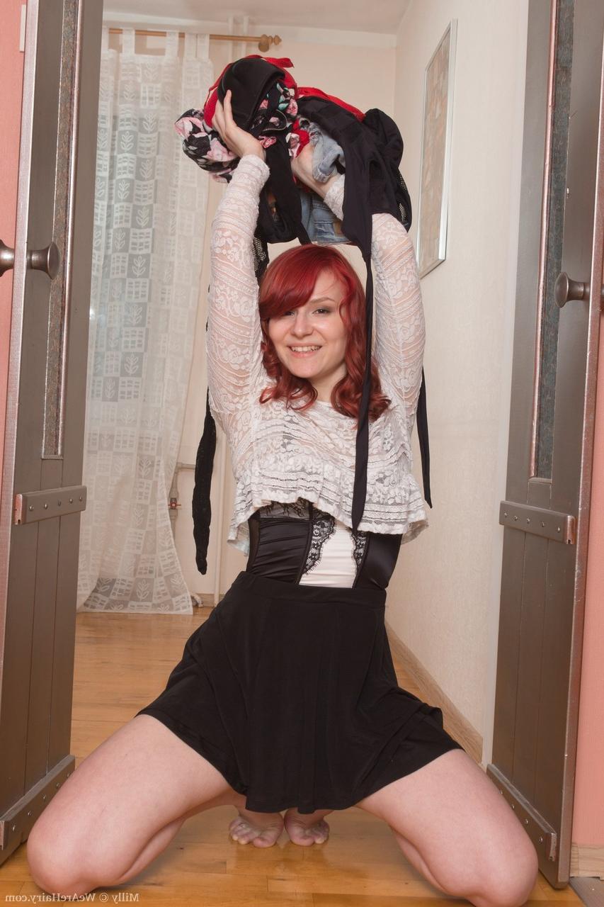 20P Amateur redhead Milly giving appetizing views of her sweet hairy pussy