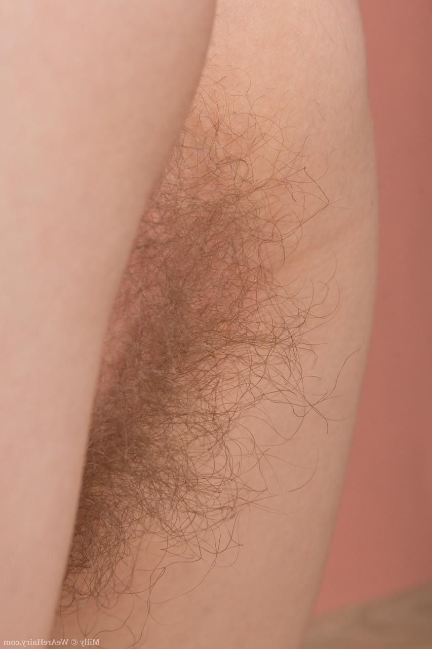 20P Amateur redhead Milly giving appetizing views of her sweet hairy pussy
