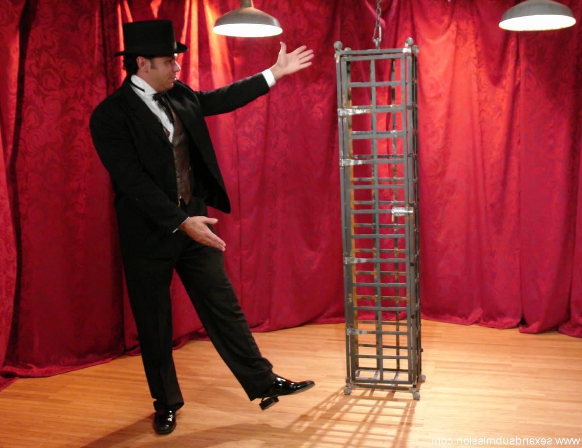 20P Skinny Asian Soolin Kelter gets caged during a magician's performance