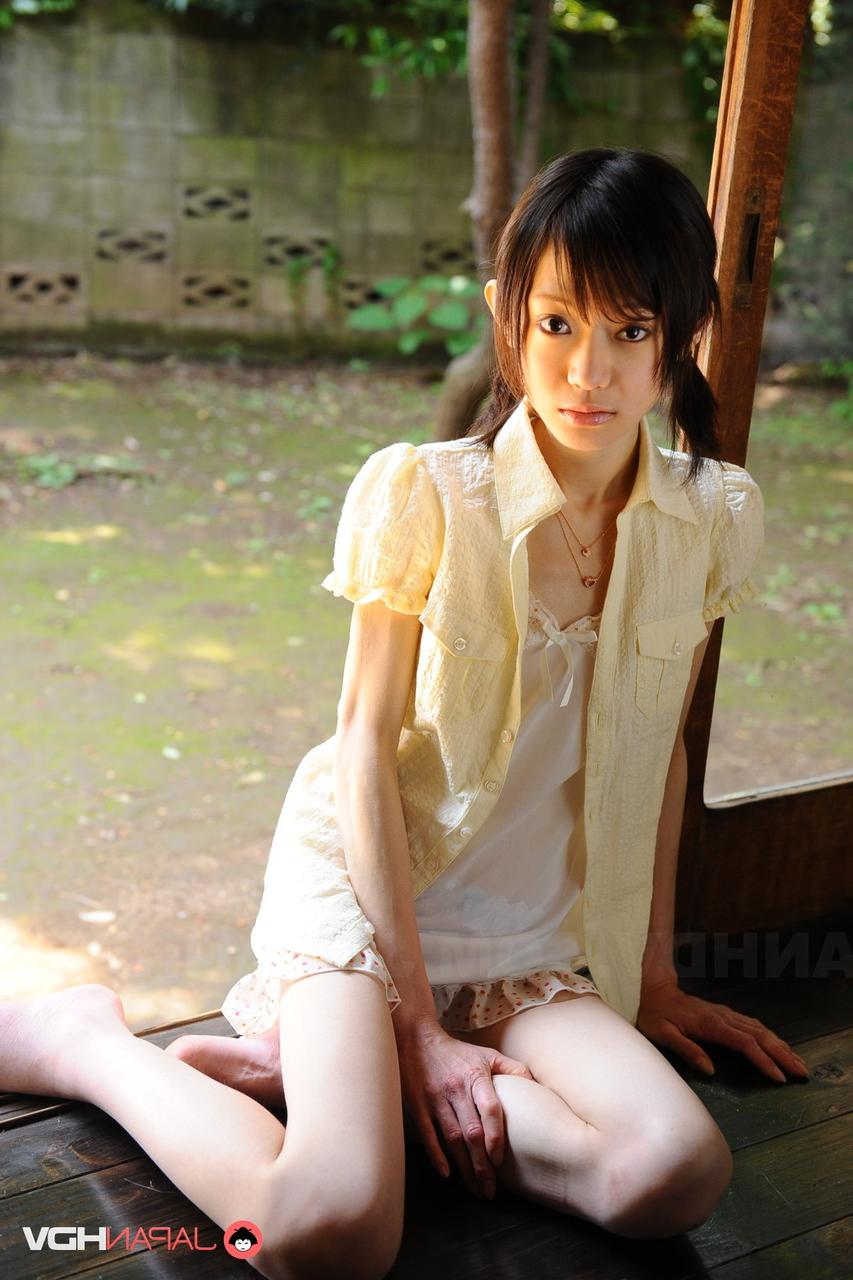 15P Tiny Japanese girl Aoba Itou models non nude in satin lingerie