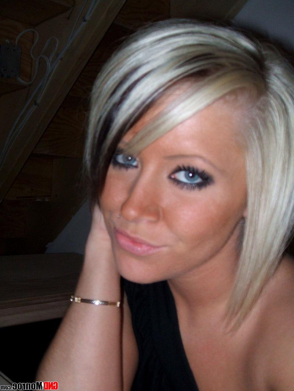 12P Amateur girl with striking eyes reveals her shaved pussy while taking selfies