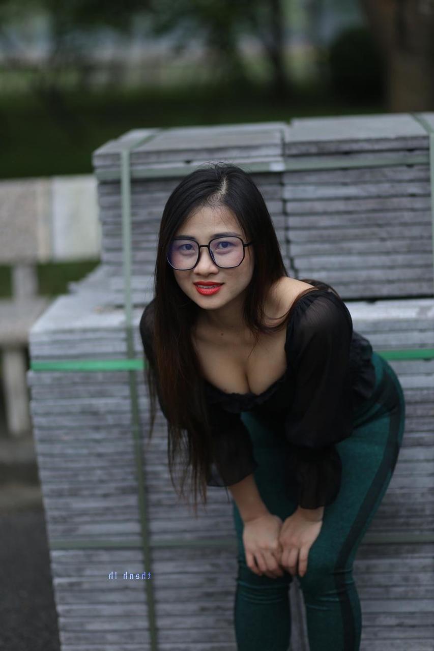 20P Pretty Asian model with glasses Elena poses in her hot blouse and pants
