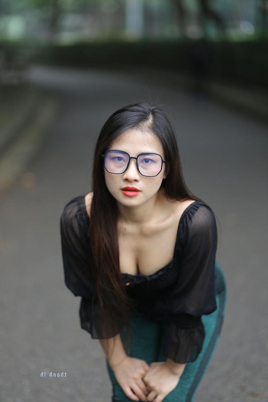 20P Pretty Asian model with glasses Elena poses in her hot blouse and pants