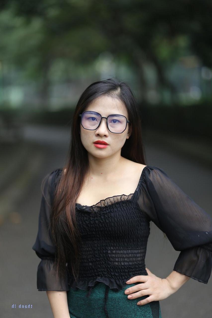 20P Pretty Asian model with glasses Elena poses in her hot blouse and pants