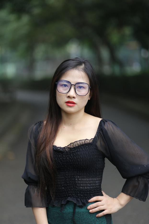 20P Pretty Asian model with glasses Elena poses in her hot blouse and pants