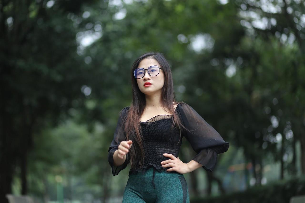 20P Pretty Asian model with glasses Elena poses in her hot blouse and pants
