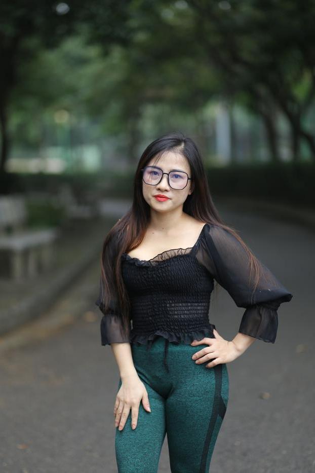 20P Pretty Asian model with glasses Elena poses in her hot blouse and pants