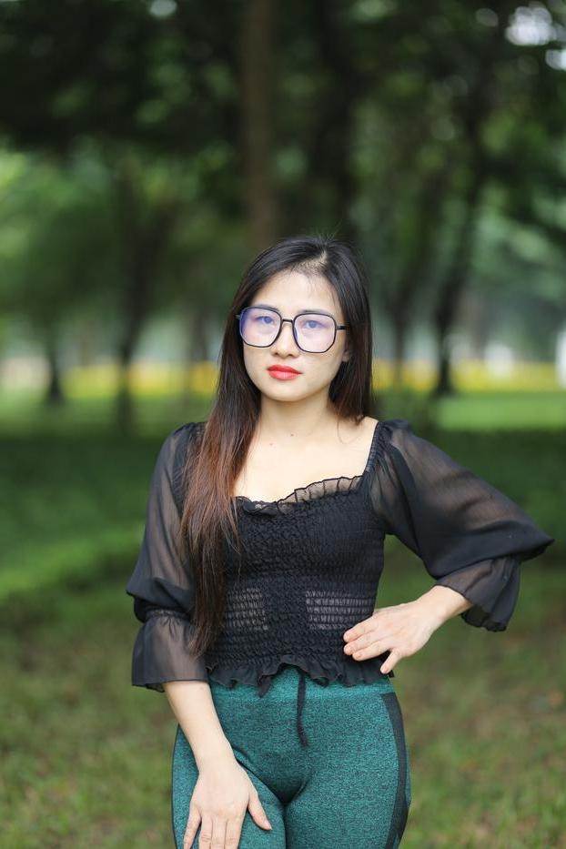 20P Pretty Asian model with glasses Elena poses in her hot blouse and pants