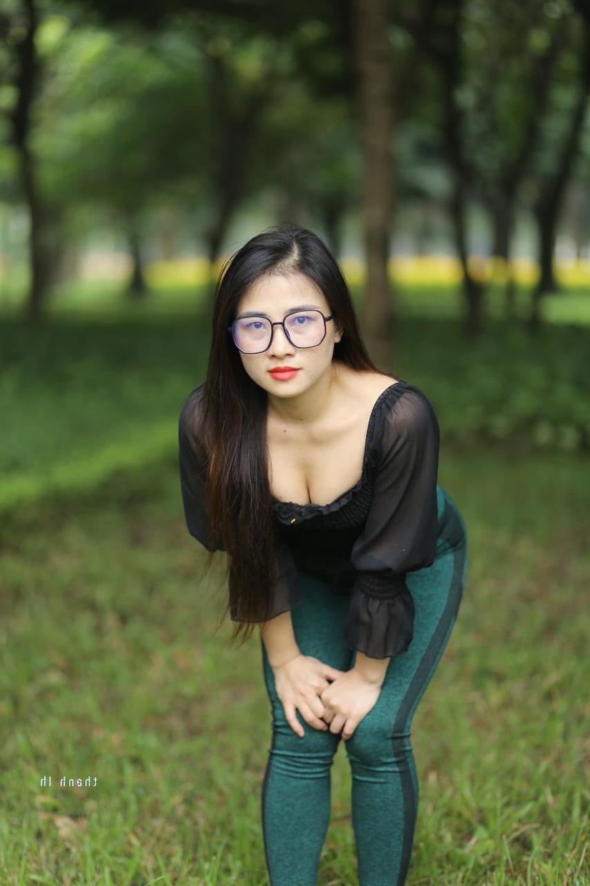20P Pretty Asian model with glasses Elena poses in her hot blouse and pants
