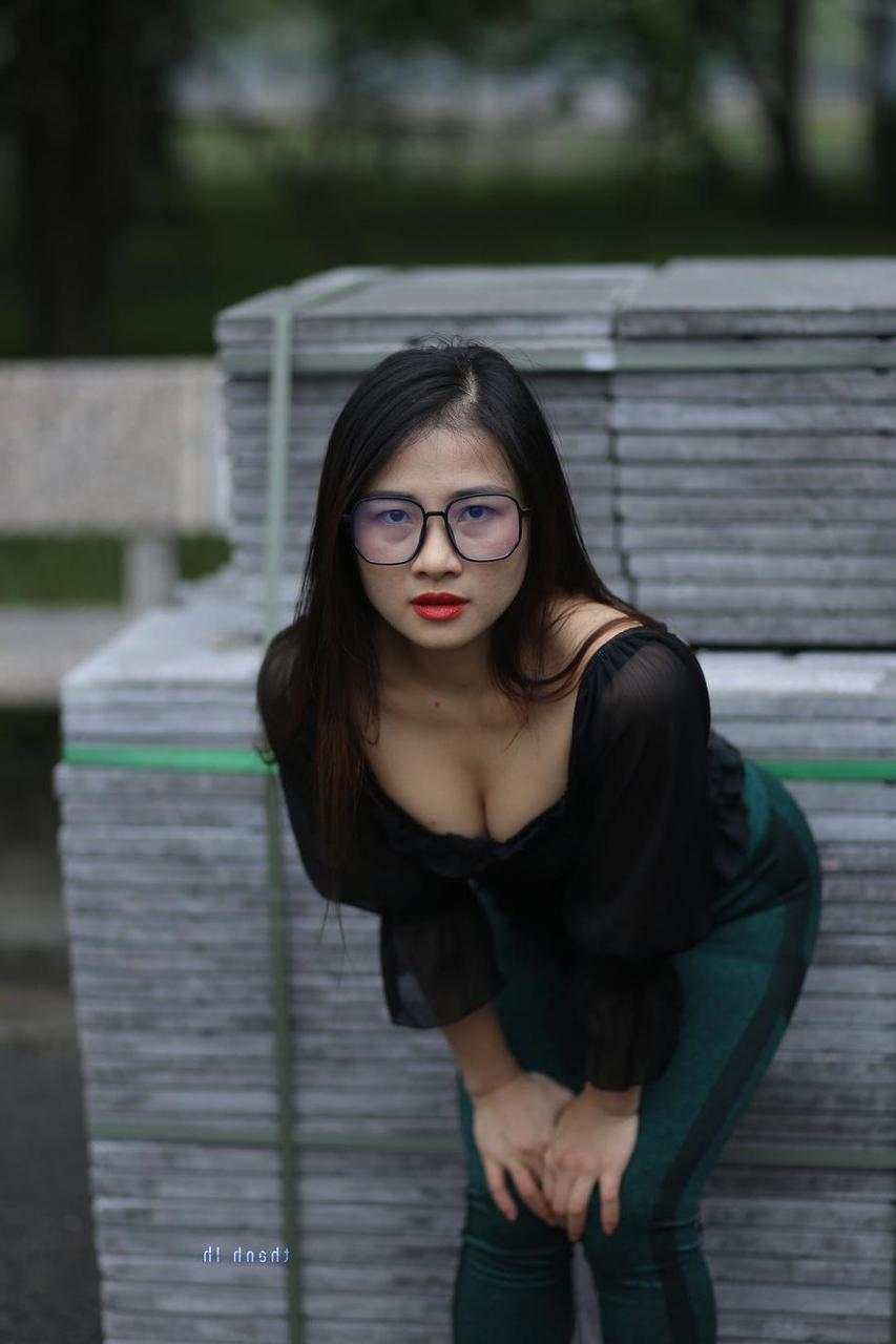 20P Pretty Asian model with glasses Elena poses in her hot blouse and pants