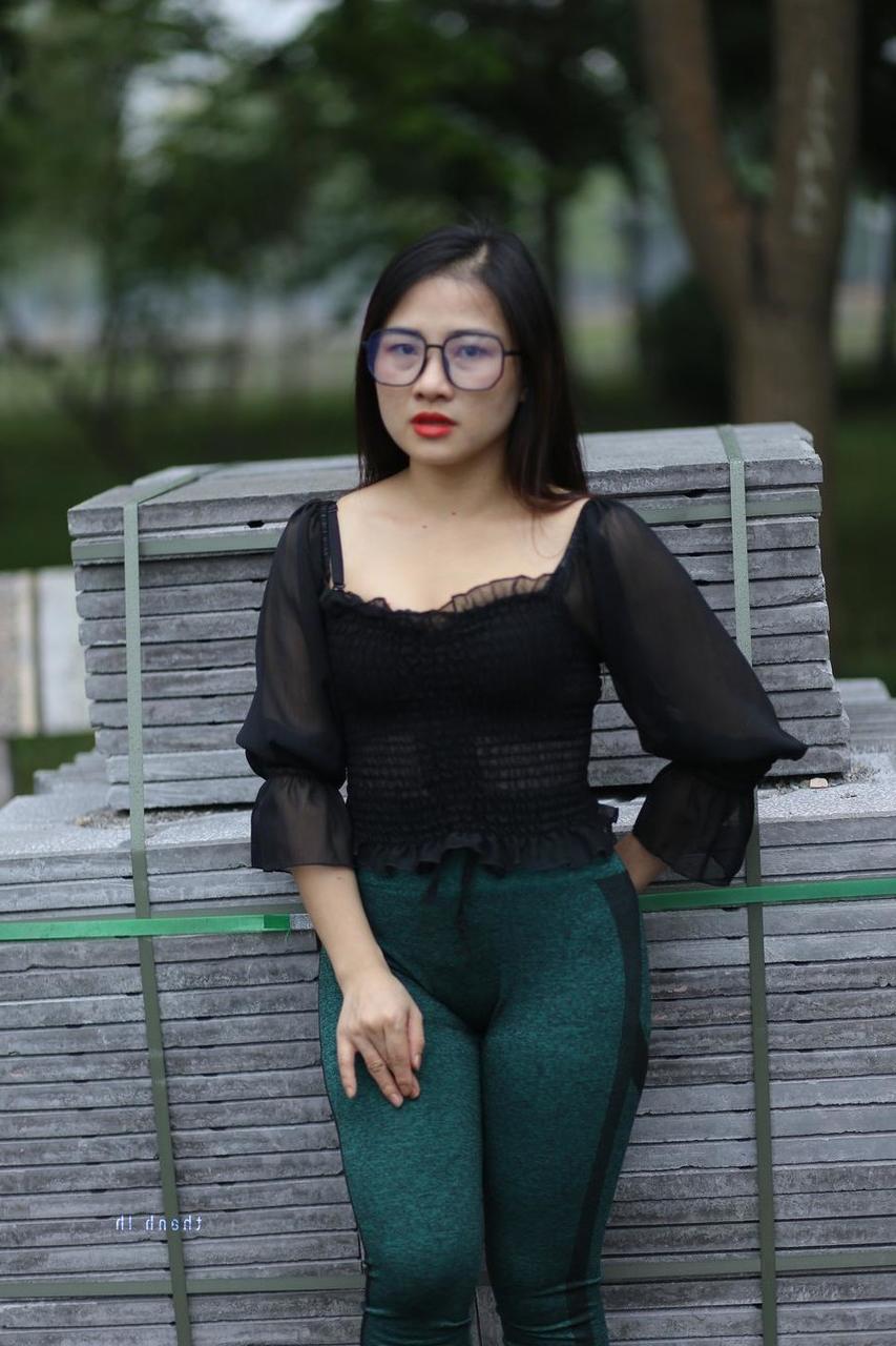 20P Pretty Asian model with glasses Elena poses in her hot blouse and pants