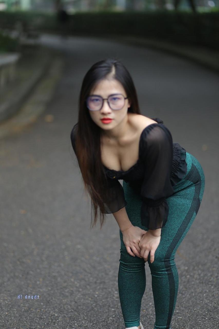 20P Pretty Asian model with glasses Elena poses in her hot blouse and pants