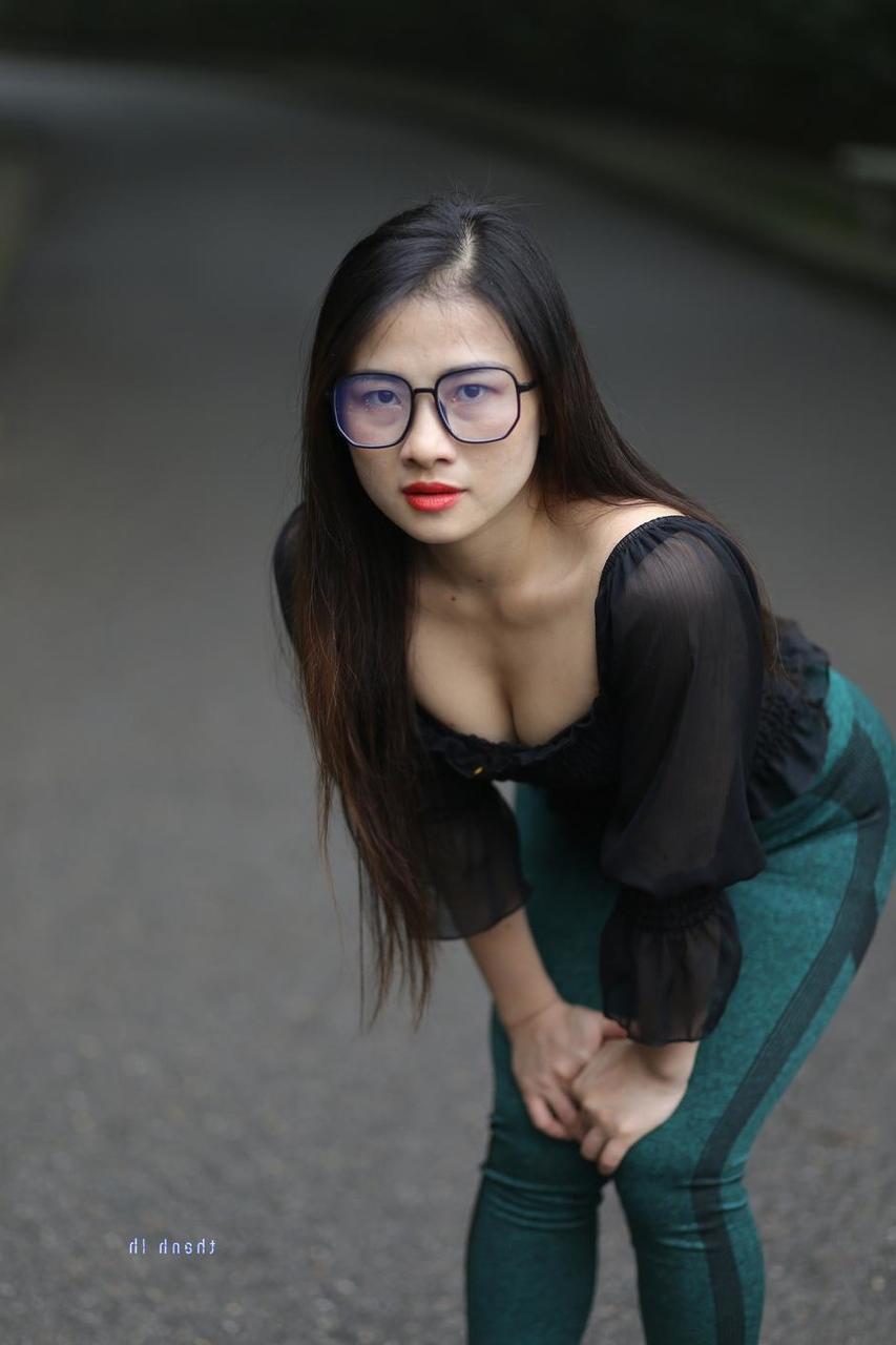 20P Pretty Asian model with glasses Elena poses in her hot blouse and pants