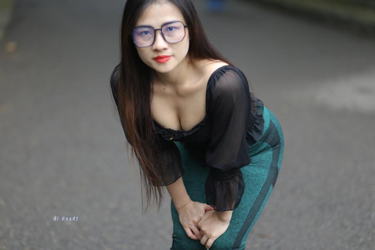 20P Pretty Asian model with glasses Elena poses in her hot blouse and pants