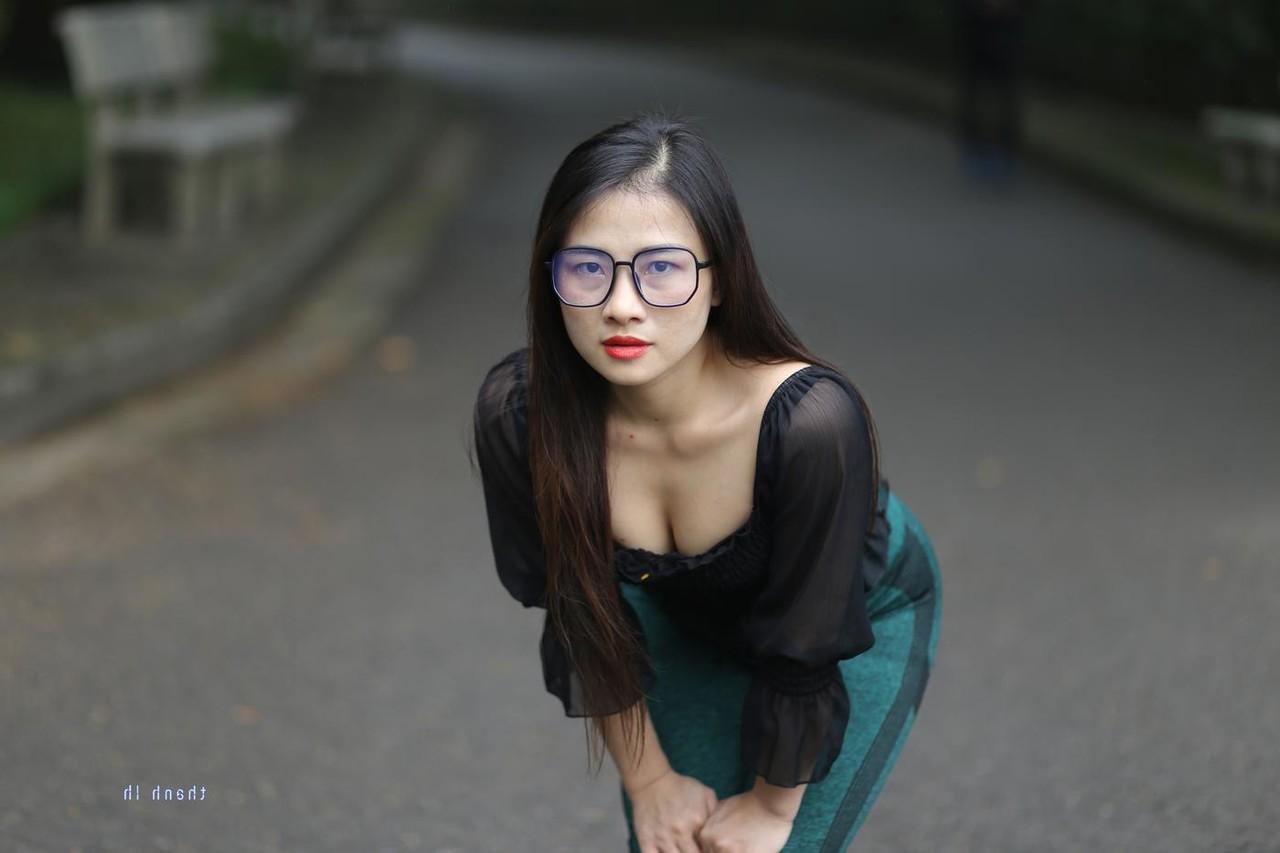 20P Pretty Asian model with glasses Elena poses in her hot blouse and pants