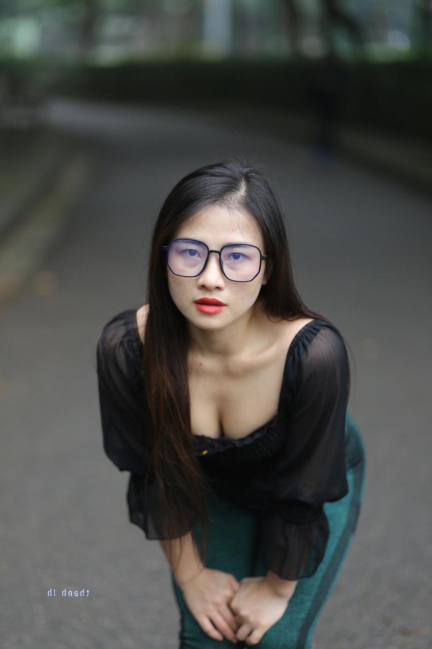 20P Pretty Asian model with glasses Elena poses in her hot blouse and pants