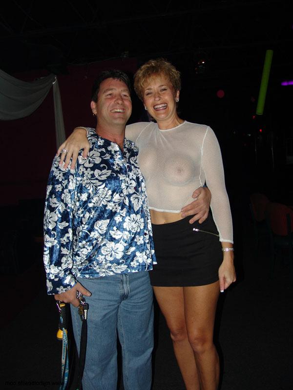 20P Mature wives strip and lick each other's tits and pussies at the nightclub