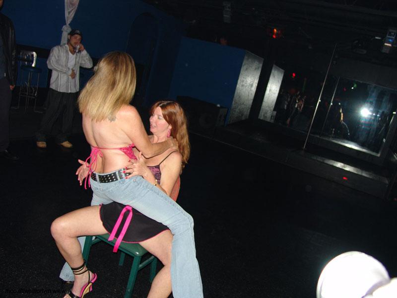20P Mature wives strip and lick each other's tits and pussies at the nightclub