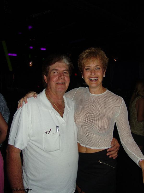 20P Mature wives strip and lick each other's tits and pussies at the nightclub