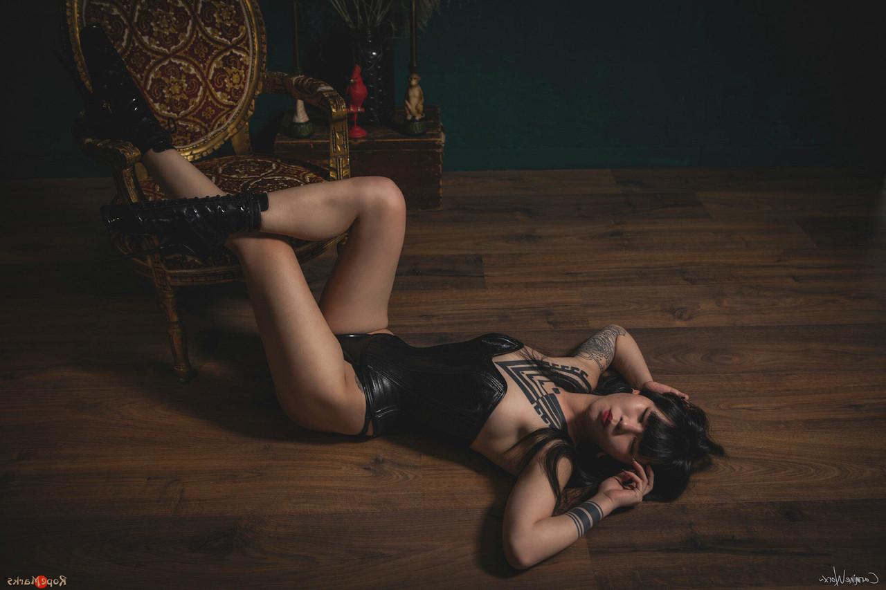 16P Asian solo model Flawless Meow poses in a leather corset and high heels