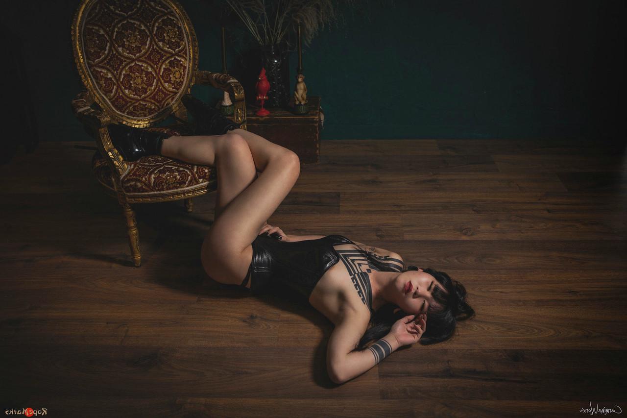 16P Asian solo model Flawless Meow poses in a leather corset and high heels