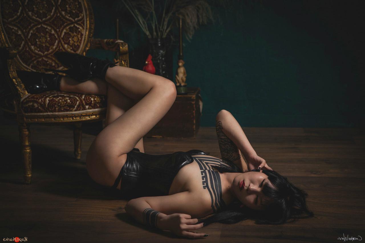 16P Asian solo model Flawless Meow poses in a leather corset and high heels
