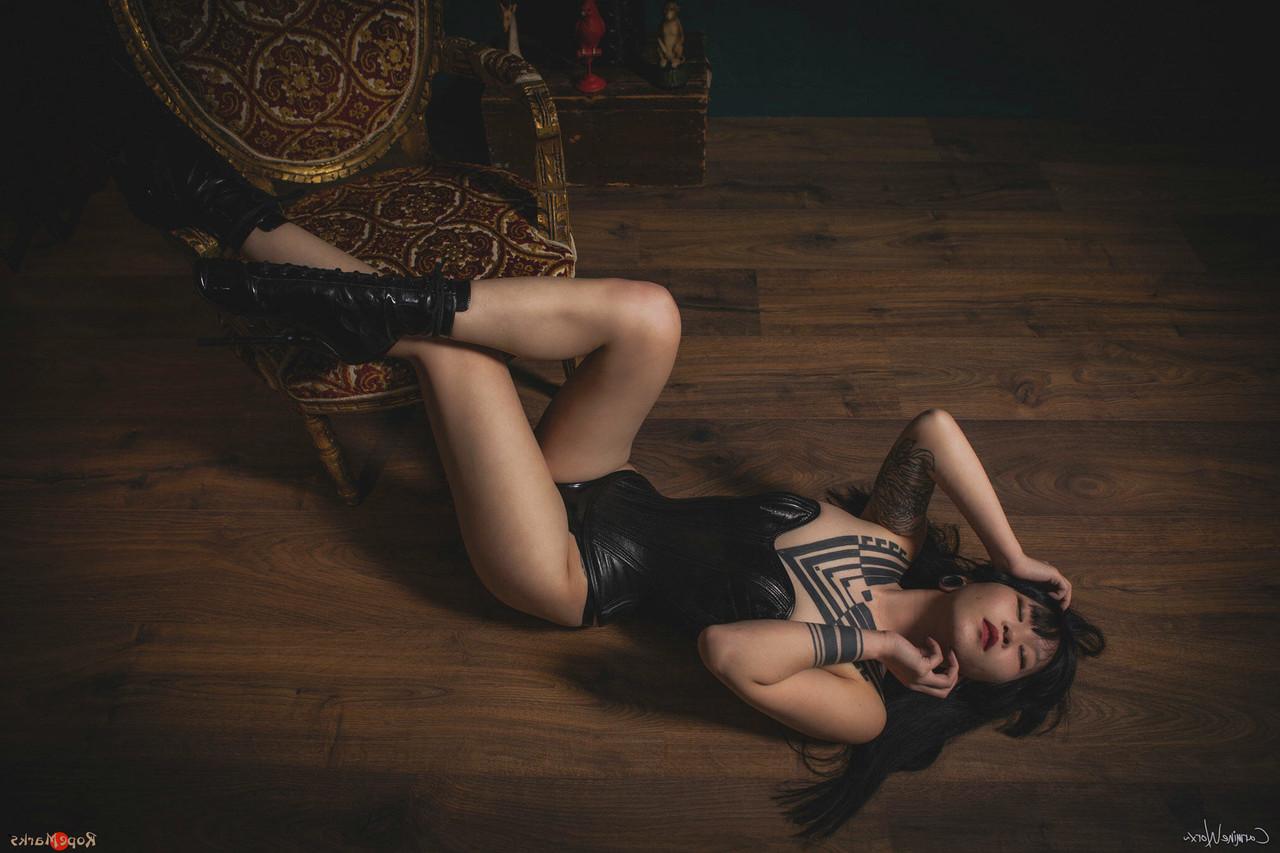 16P Asian solo model Flawless Meow poses in a leather corset and high heels