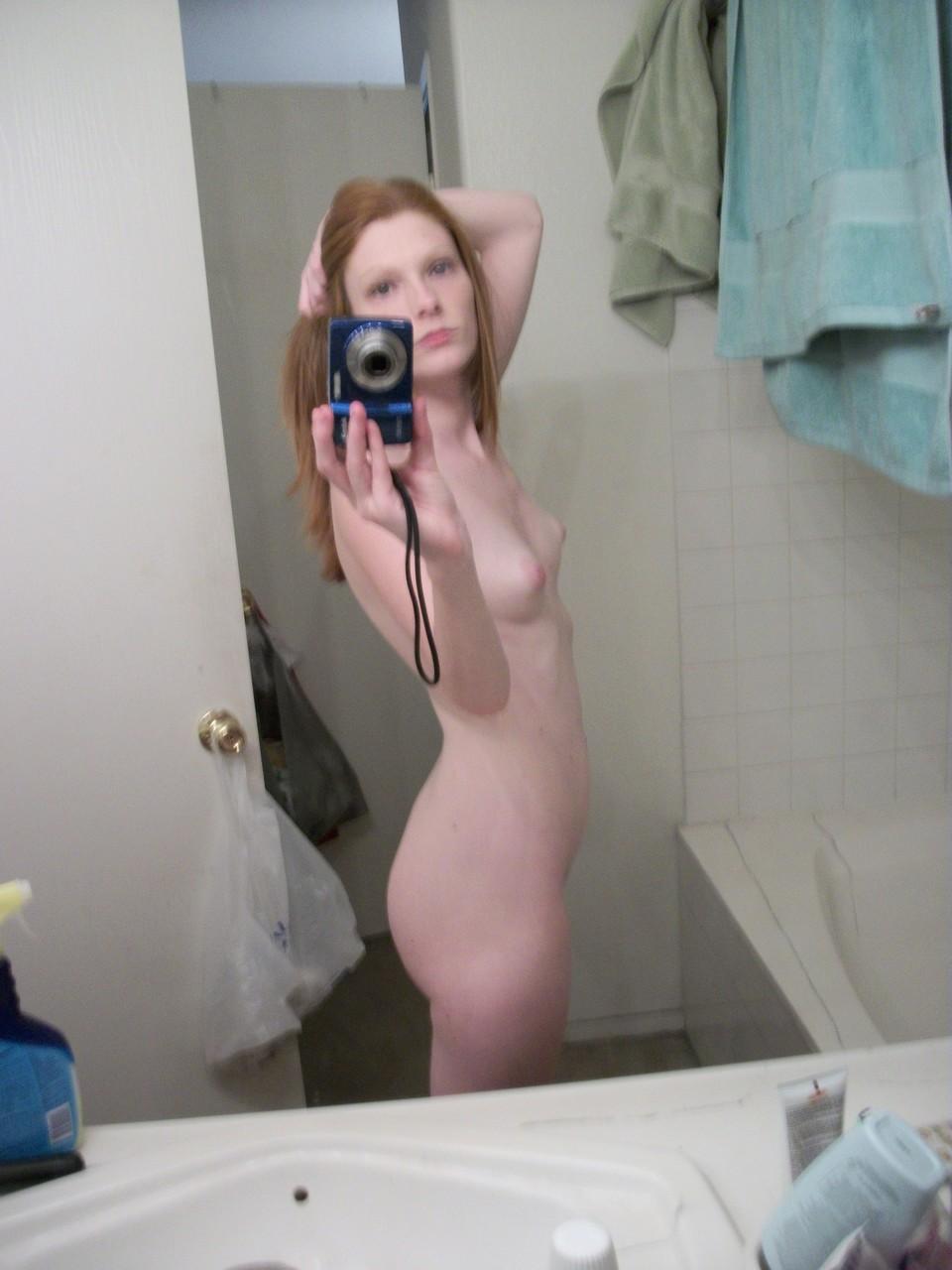 20P Ginger amateur Emily takes selfies of her naked teen body in the mirror