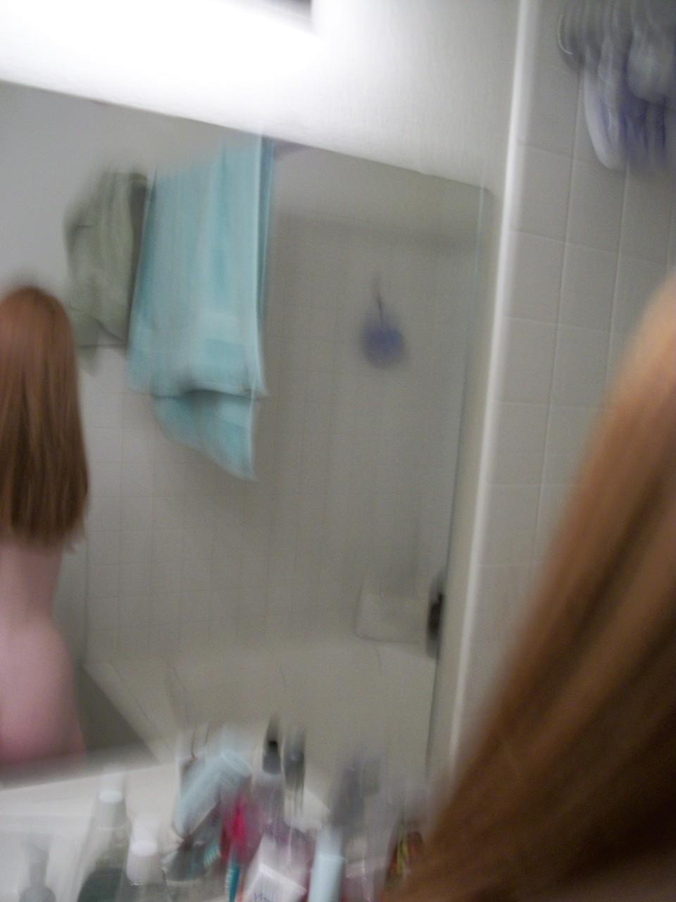 20P Ginger amateur Emily takes selfies of her naked teen body in the mirror