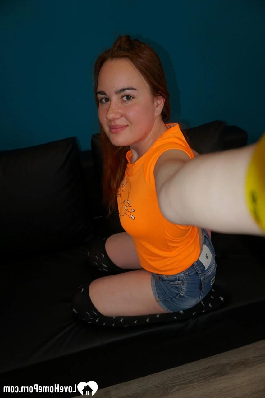 11P Young redhead takes nude selfies showing her natural tits & her big ass