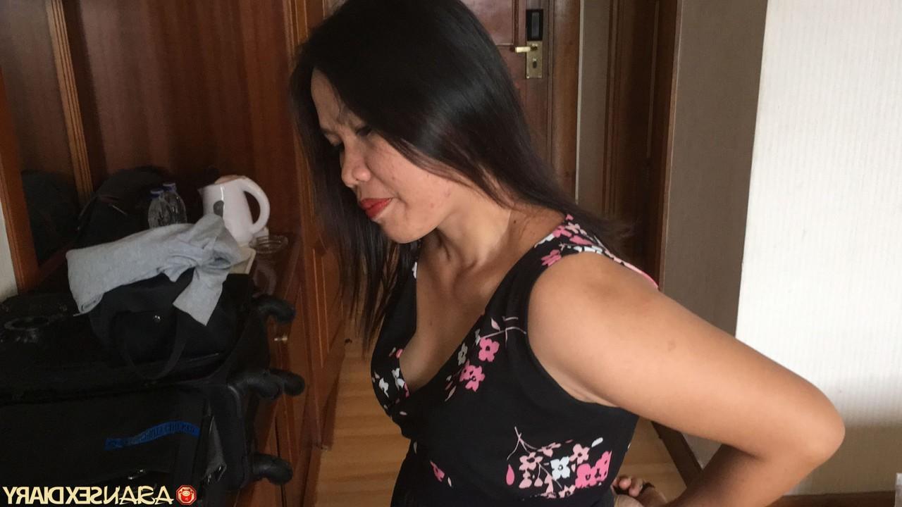 20P Asian MILF Arif shows her shaved pussy up close after enjoying a big dick