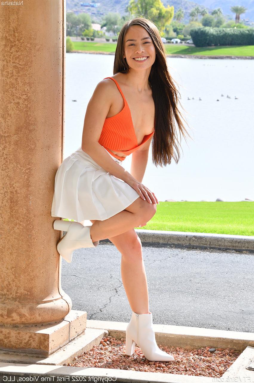 15P Pretty Asian girl Natasha wears no panties during public upskirt action