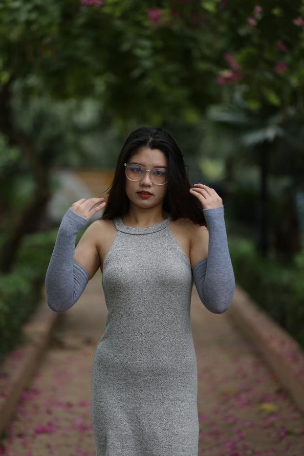 20P Slutty Asian babe with glasses Natalia posing in her provocative outfit