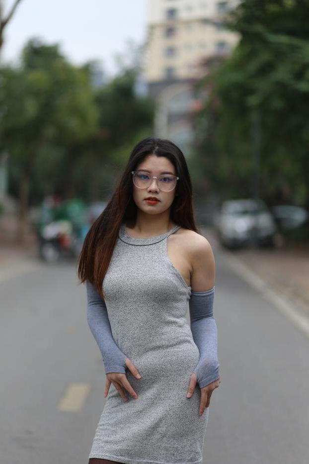 20P Slutty Asian babe with glasses Natalia posing in her provocative outfit