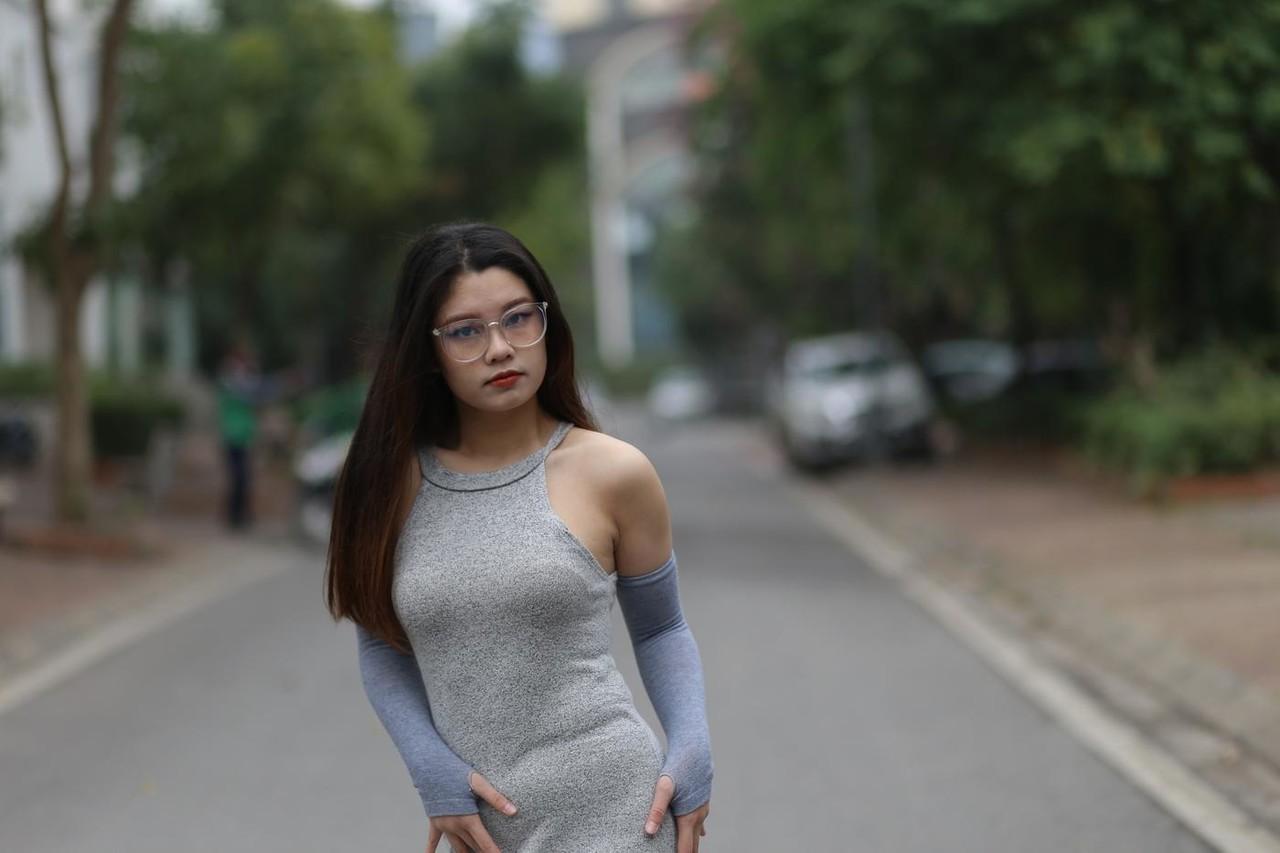 20P Slutty Asian babe with glasses Natalia posing in her provocative outfit