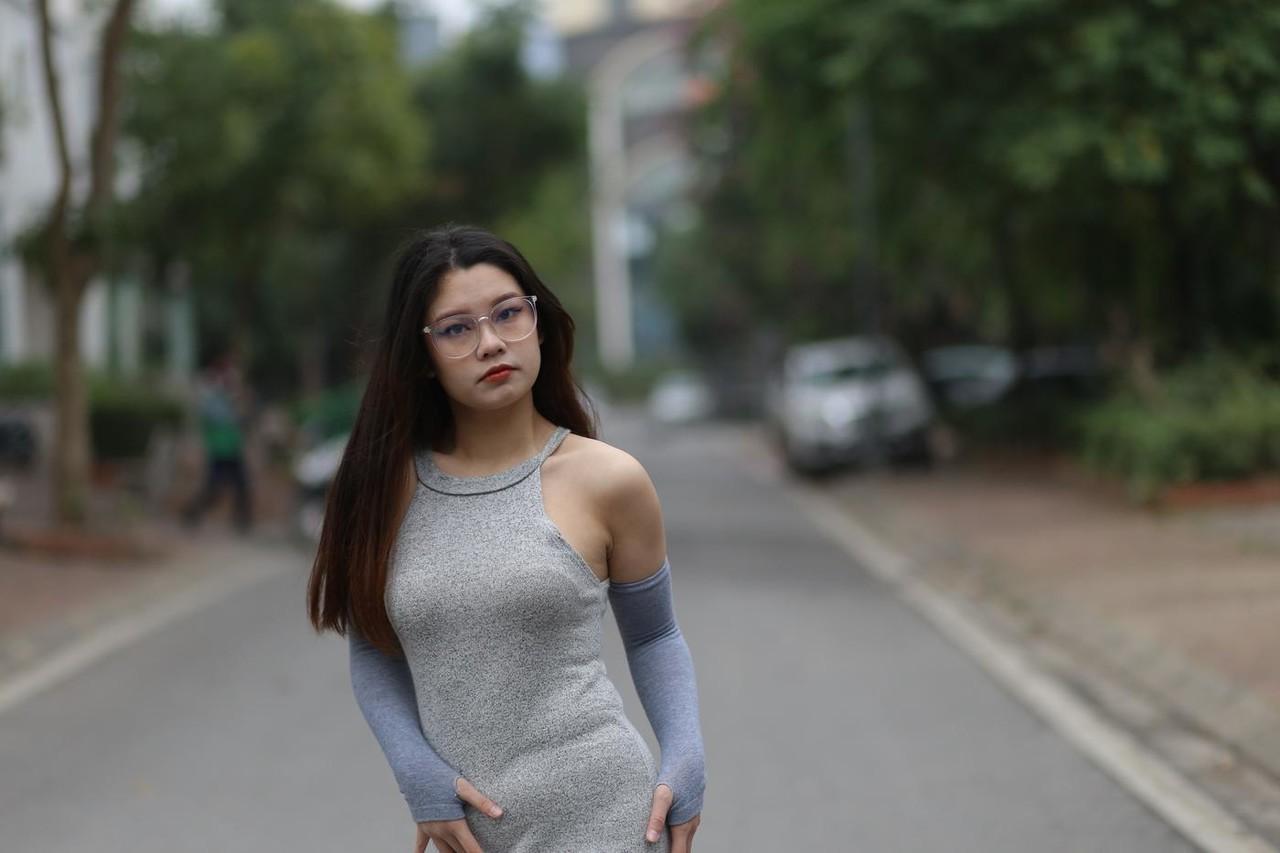 20P Slutty Asian babe with glasses Natalia posing in her provocative outfit