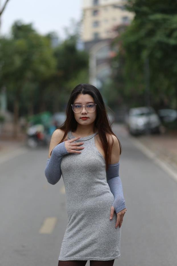 20P Slutty Asian babe with glasses Natalia posing in her provocative outfit