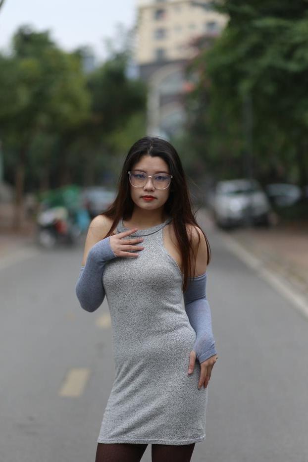 20P Slutty Asian babe with glasses Natalia posing in her provocative outfit