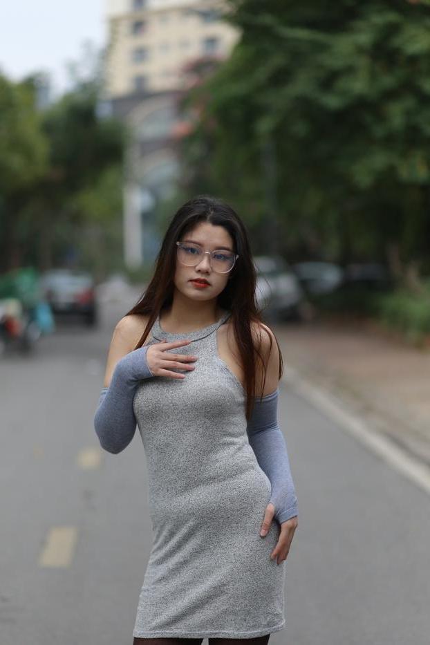 20P Slutty Asian babe with glasses Natalia posing in her provocative outfit