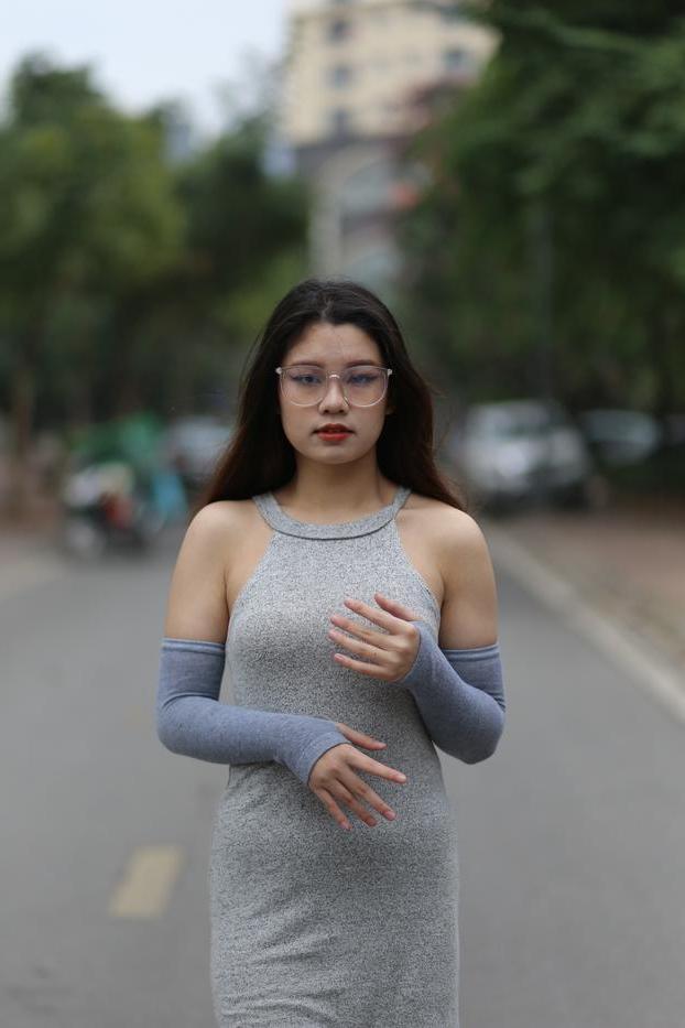 20P Slutty Asian babe with glasses Natalia posing in her provocative outfit