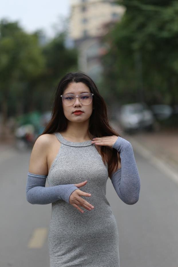 20P Slutty Asian babe with glasses Natalia posing in her provocative outfit