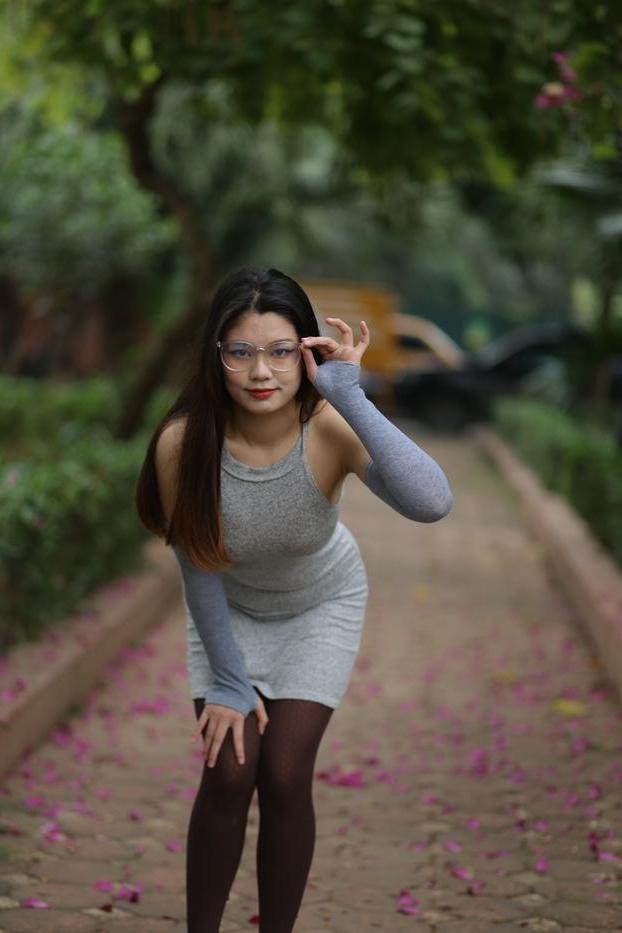 20P Slutty Asian babe with glasses Natalia posing in her provocative outfit